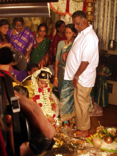 Bride washing her parents feet