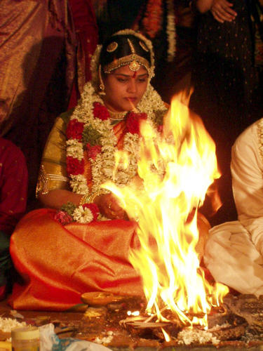 The fire (Agni) serves at witness to the wedding