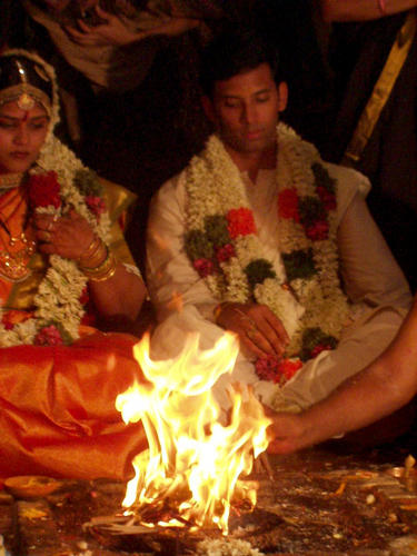 The fire (Agni) serves at witness to the wedding