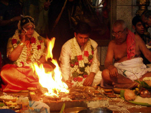 The fire (Agni) serves at witness to the wedding