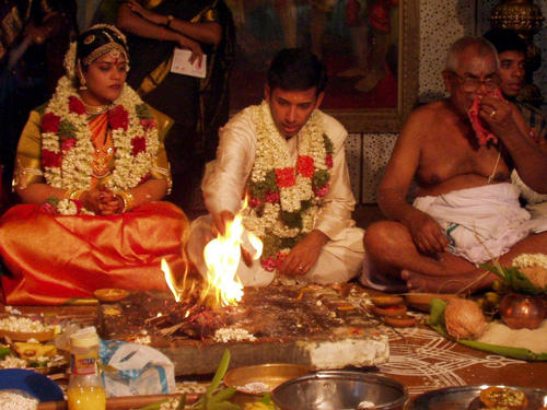 The fire (Agni) serves at witness to the wedding