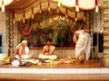 priest and groom -- waiting for the bride