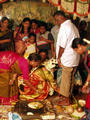 Bride washing her parents feet